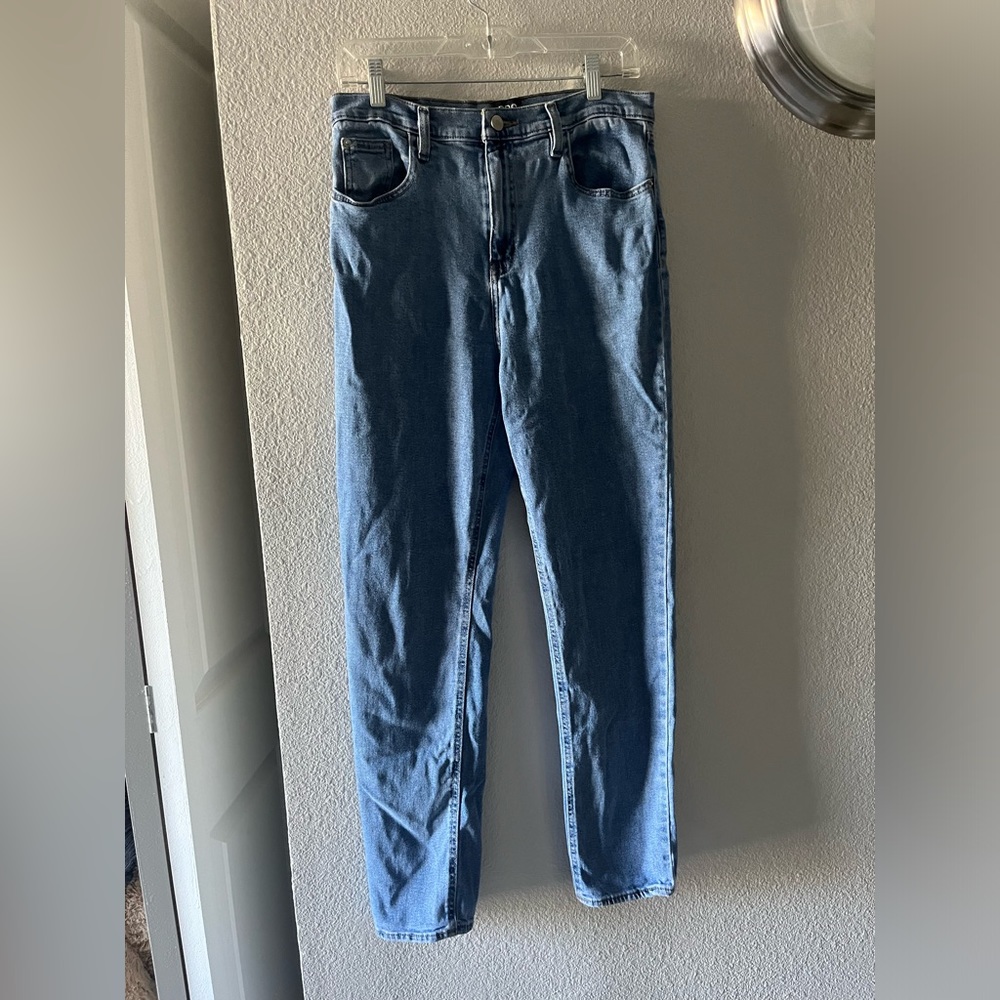 BDG high rise medium wash girlfriend jeans.